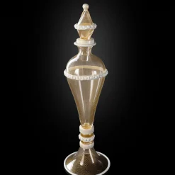 Officine di Murano 1295 Stmat Vaso con piede in oro e bianco 24 carati con coperchio><noscript><img width=