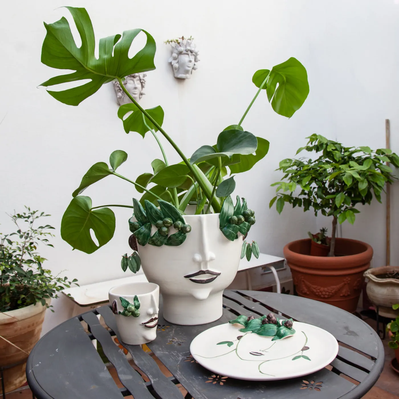 Patrizia Italiano Vaso con testa di venditore di olio Oliva> Vasi Figurativi